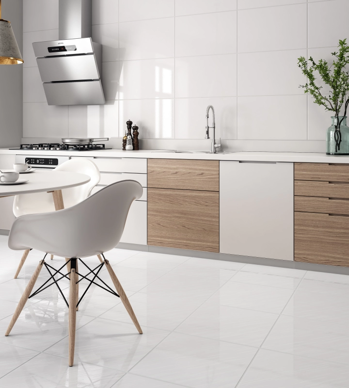 Cozinha clean e minimalista com revestimento para cozinha de parede em cerâmica branca. A imagem ilustra modelos de cerâmica para cozinha e pisos para cozinha baratos nas ofertas Black Friday. Cozinha clean e minimalista com revestimento para cozinha de parede em cerâmica branca. A imagem ilustra modelos de cerâmica para cozinha e pisos para cozinha baratos nas ofertas Black Friday.